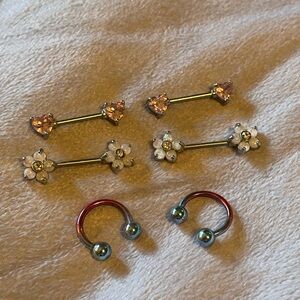 Heart and Flower Nipple Piercings